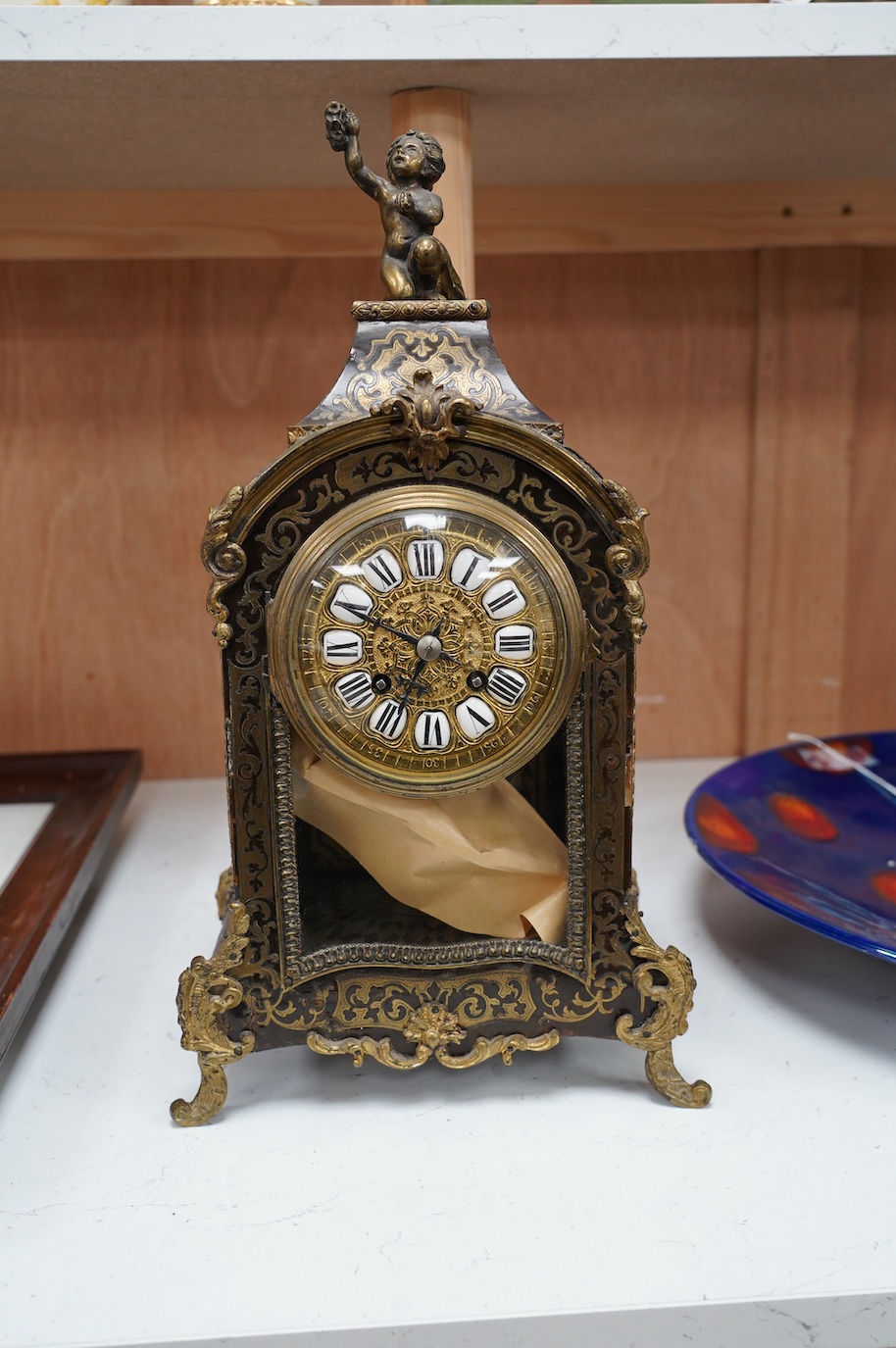 A late 19th century French boulle work mantel clock, with key and pendulum, 40cm. Condition - fair to good, generally worn, not tested as working